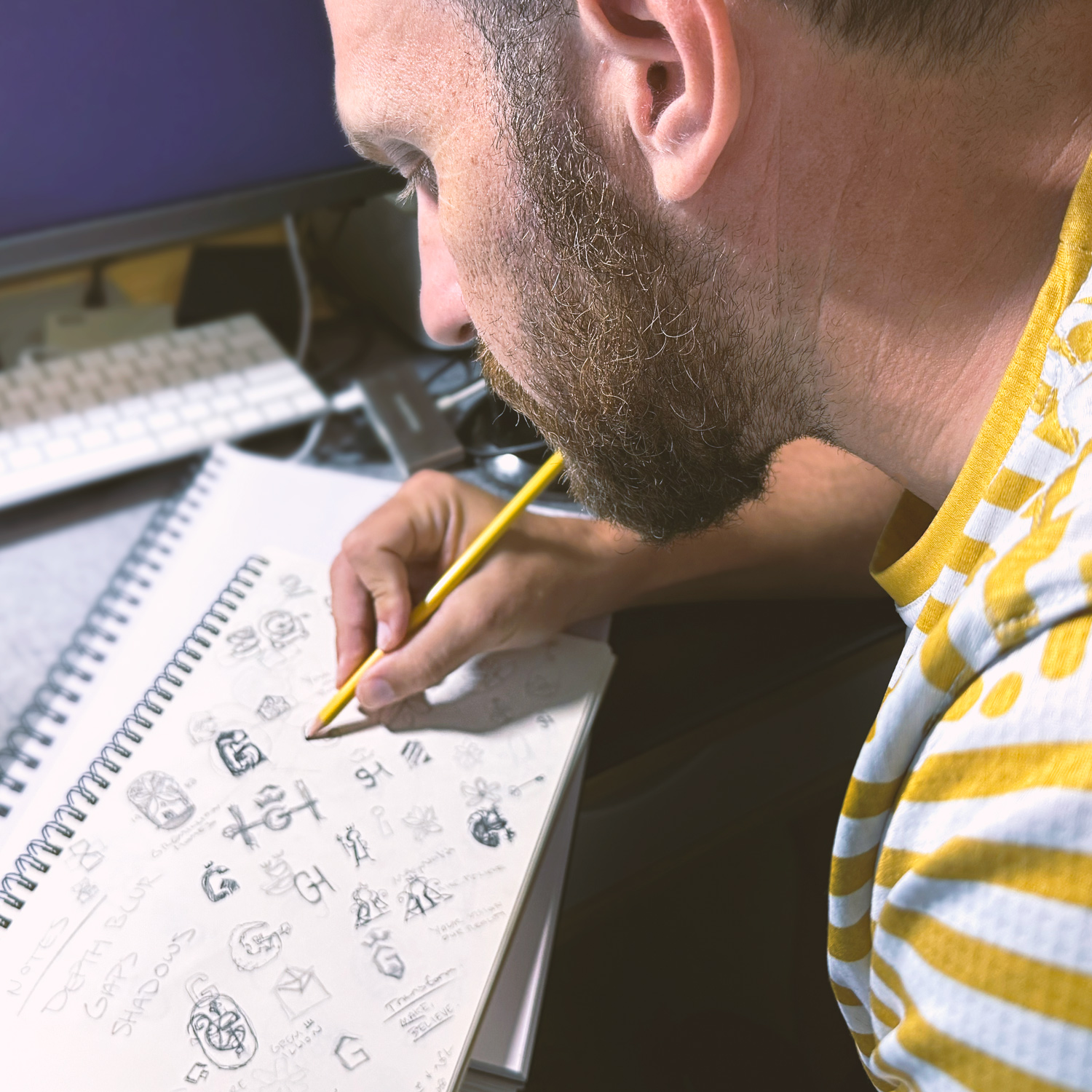 Peter Giuffria Sketching at desk